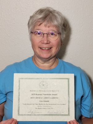 Region 1 President Lisa Schmidt won the 2025 Regional Newsletter Award, for Best Article About Gardens with “North Dakota Takes Daylilies to The International Peace Gardens”. Photo by Jeff Schmidt